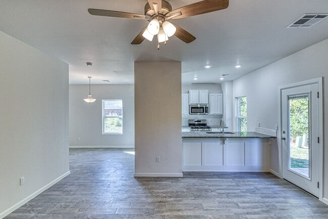 Building Photo - Brand New Construction! Lawn care included!