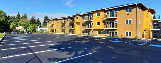 Building Photo - Spacious Two-Bedroom, Two-Bath Living at Marigold Apartments — Available Now