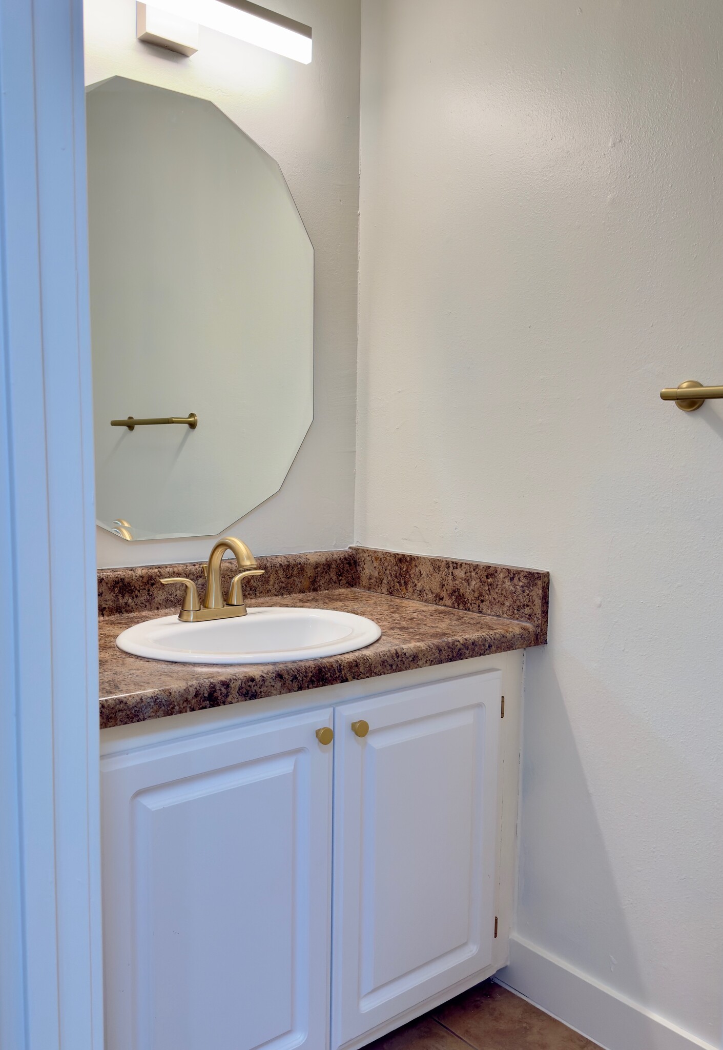 Downstairs half bath - 27 Court Dr