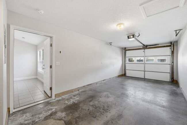 Building Photo - Single-Level Apartment Homes with Attached Private Garages – No Upstairs Neighbors