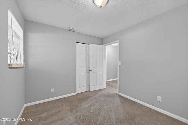 Building Photo - 6955 Miss Muffet Ln S