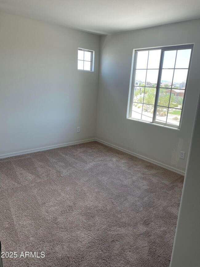 Building Photo - 8960 W San Miguel Ave