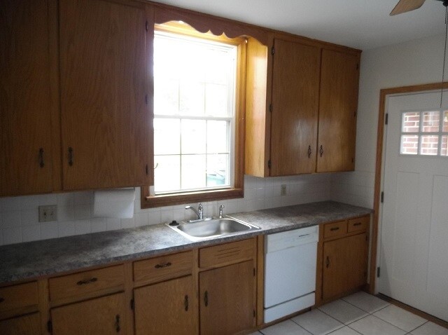 Kitchen has new countertops and sink. Garbage disposal and dishwasher. - 742 E Ford Ave