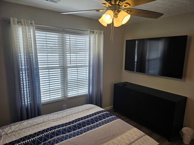 Building Photo - Vroooom . . . . the ROAD is calling. . . .Fully furnished themed rental includes all utilities an...