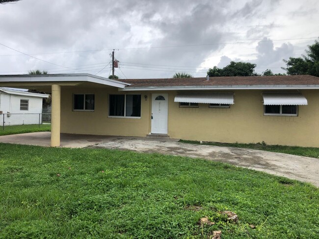 Building Photo - Large 3-2 with impact windows