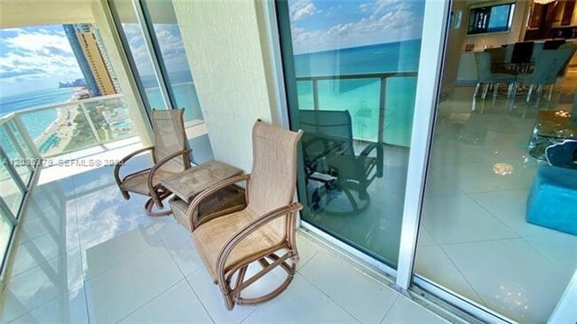 Building Photo - 16699 Collins Ave