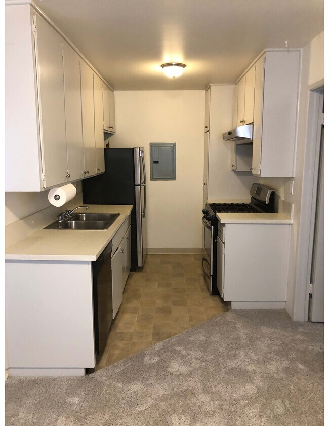 Kitchen view from dining area - 12030 Rochester Ave