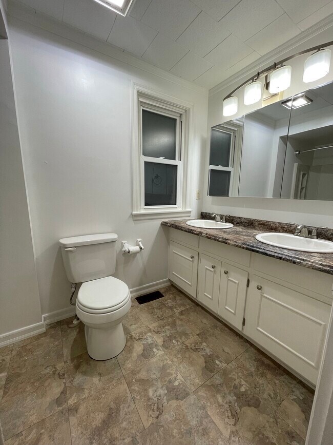 full bathroom with double vanity - 2310 Old Berwick Rd