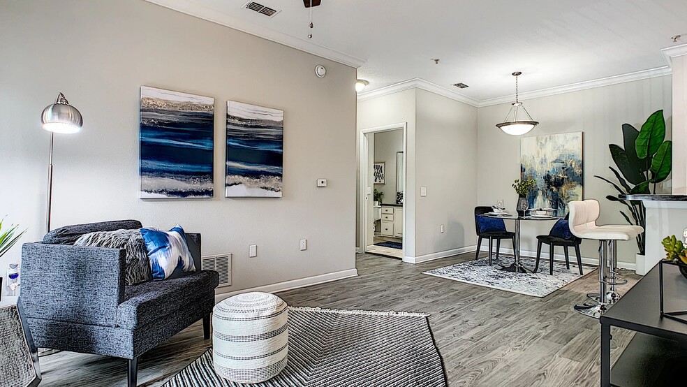 Our apartment homes offer open-concept living, seamlessly connecting living, dining, and kitchen spaces. - Elevate 155