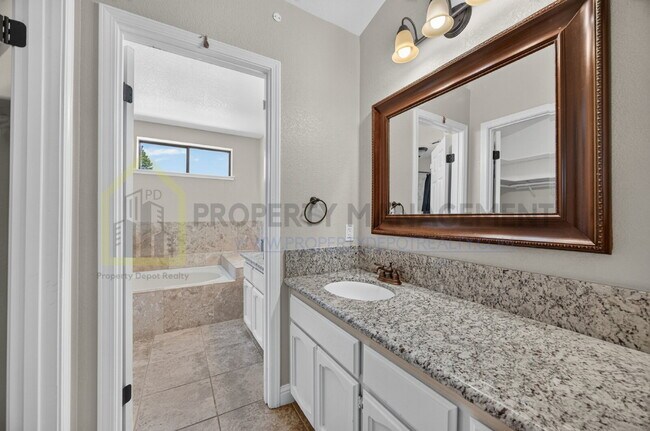 Building Photo - Spacious 4-Bedroom Retreat with 2.5 Baths