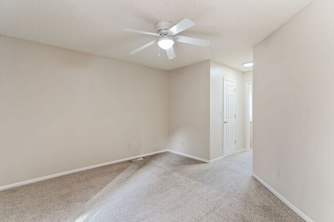 Building Photo - Updated 3-Bedroom Condo with Granite Kitchen in Low-Maintenance Community