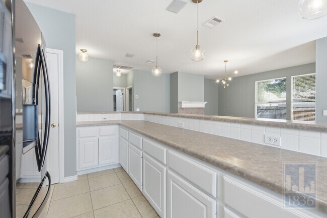 Building Photo - 4011 Travis Country Cir