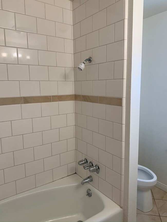 Building Photo - FANTASTIC CONDO IN THE HEART OF BELMONT SH...
