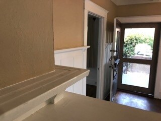 Display shelf runs continuously throughout the living/dining area - 367 Junipero Ave
