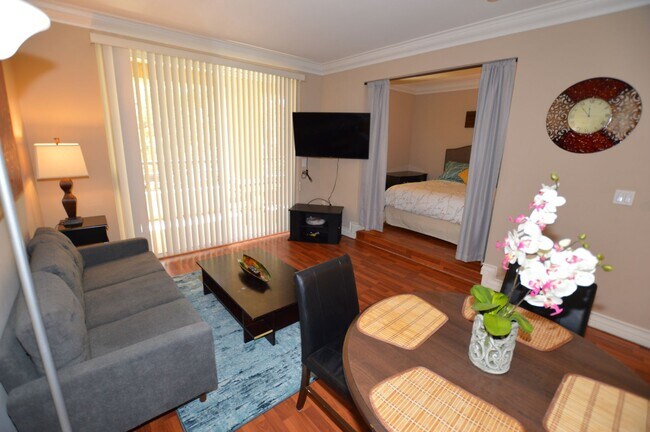 Building Photo - Meridian STUDIO Condo Fully Furnished w/Main Pool View-Lush Green trees in Resort Style Community.