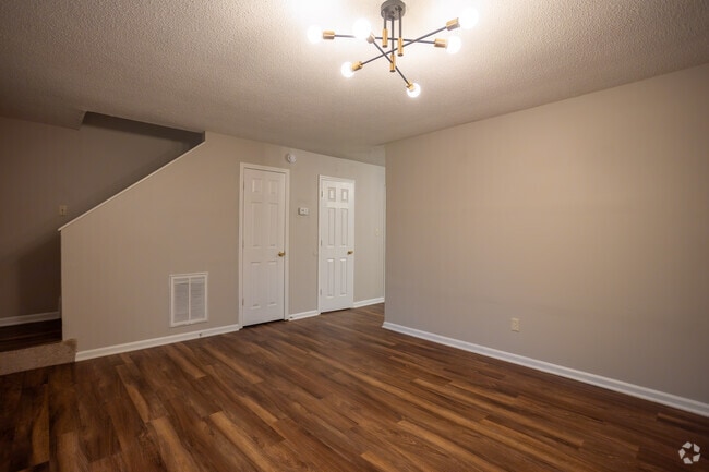 2BR,1.5BA - 1,105SF - Living Room - Walter, Park & Wood