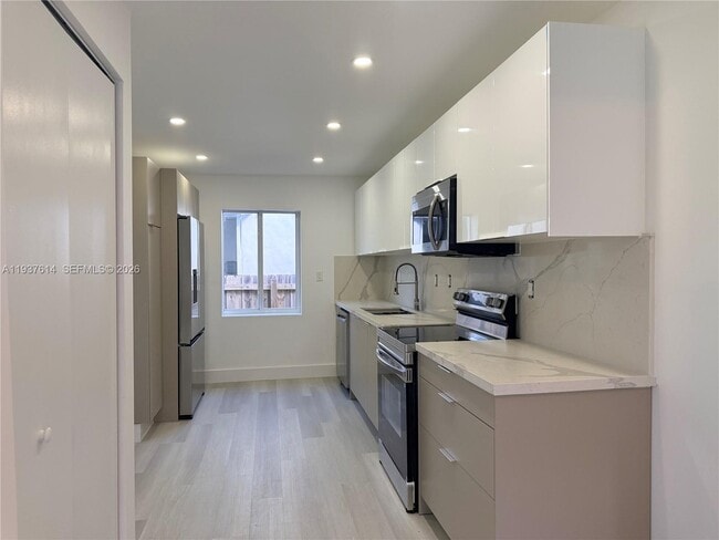 Building Photo - 561 NW 41st St