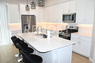 Building Photo - Price Improved – Spacious Townhome in a Gated Community!
