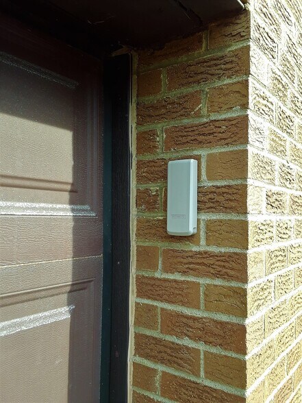 Automatic garage door opener key pad - 416 Brierly Ln