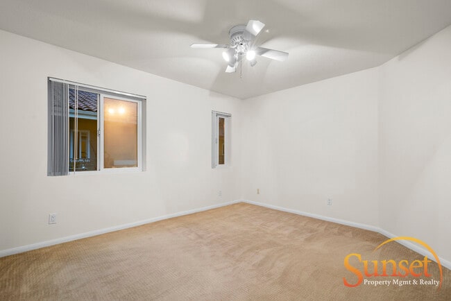 Building Photo - 7565 Charmant Dr