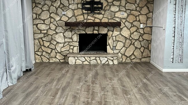 Building Photo - Peaceful 3-Bedroom Home in a Wooded Rockford Neighborhood