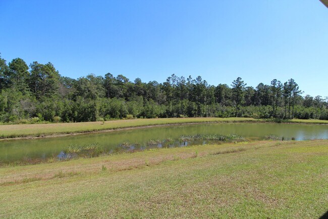 Building Photo - Don’t Miss This 4BR Home — 3-Car Garage, Modern Interior, Open Layout & Community Pool in Prime 9...