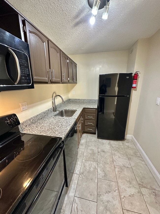 Building Photo - Dupont's Pulchritudinous Palladium 1 bedroom Condo w/ Balcony & Pool. All utilities included.