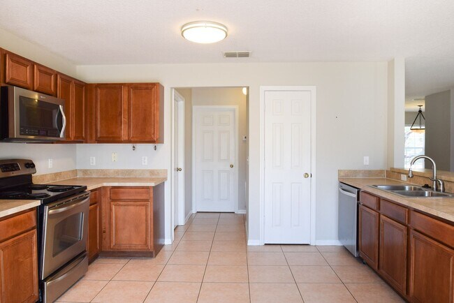 Building Photo - Four Bedroom Home at Waterford Trails in O...