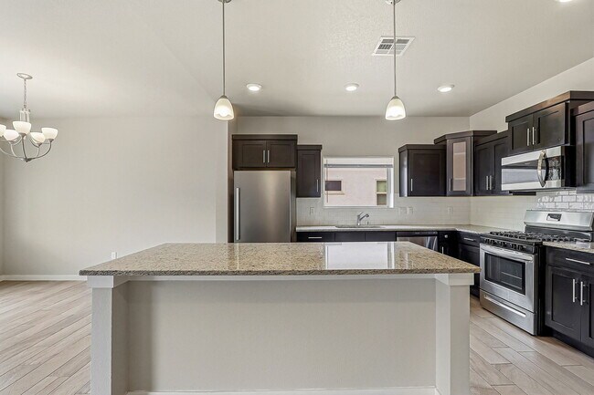 Building Photo - 14740 Mike a Mendoza Ave
