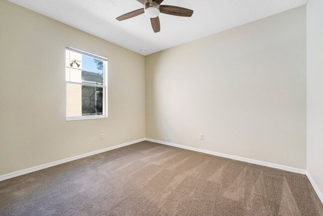 Building Photo - Cozy 4/2 Home Nestled in a Gated Community