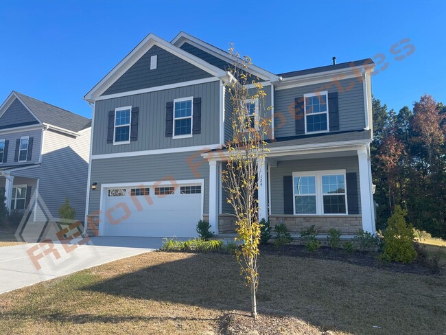 Building Photo - Beautiful 5 Bedroom 2-Car Garage Home with...
