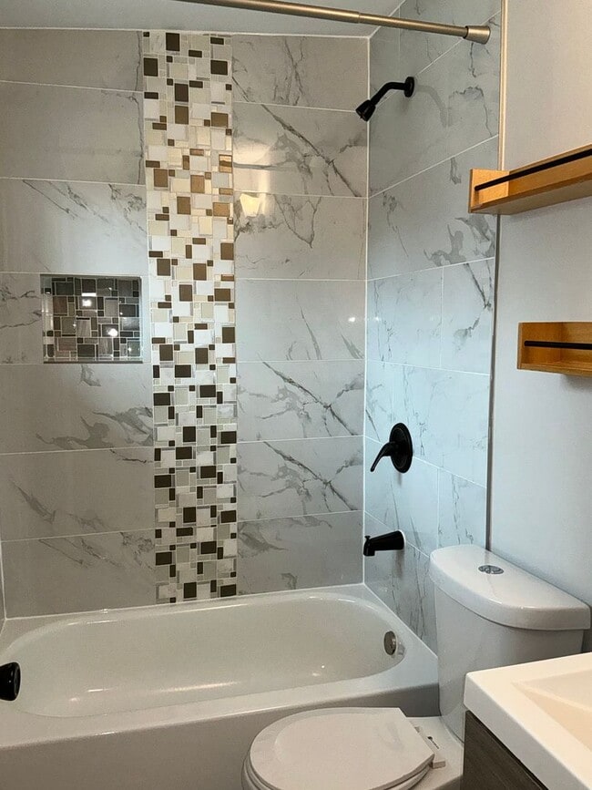 Building Photo - Fully updated 4BR 3BA single family rambler in Twinbrook Forest