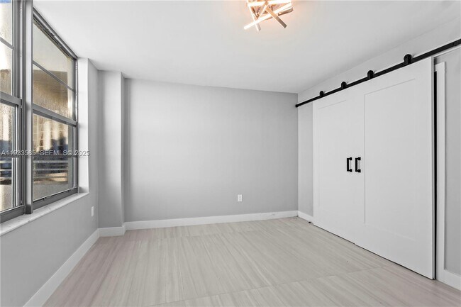 Building Photo - 5555 Collins Ave