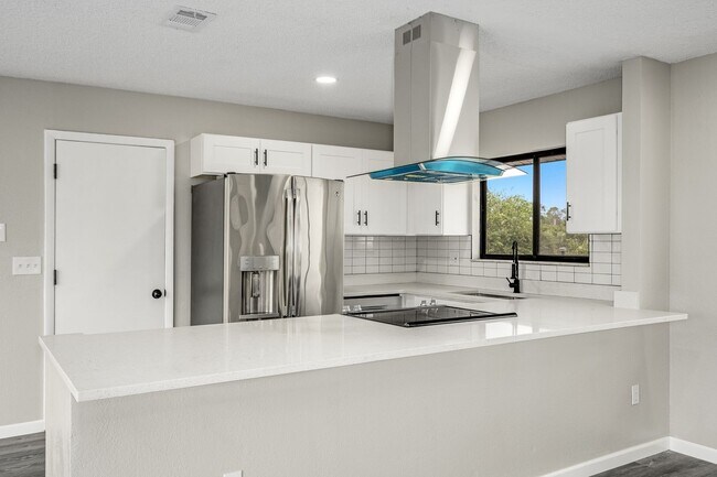 Building Photo - Charming Palm Bay Retreat - Perfect for Relaxation and Entertainment!