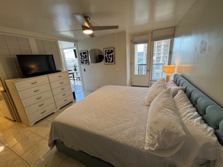 King size bed with dresser and TV - 444 Nahua St