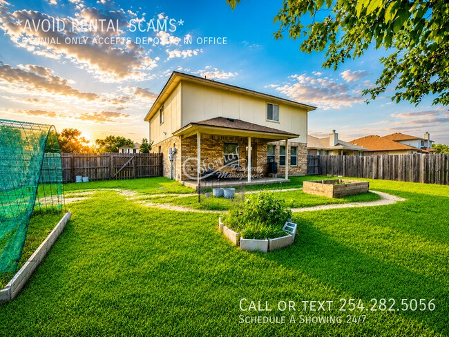 Building Photo - 5406 Boot Scootin Ct