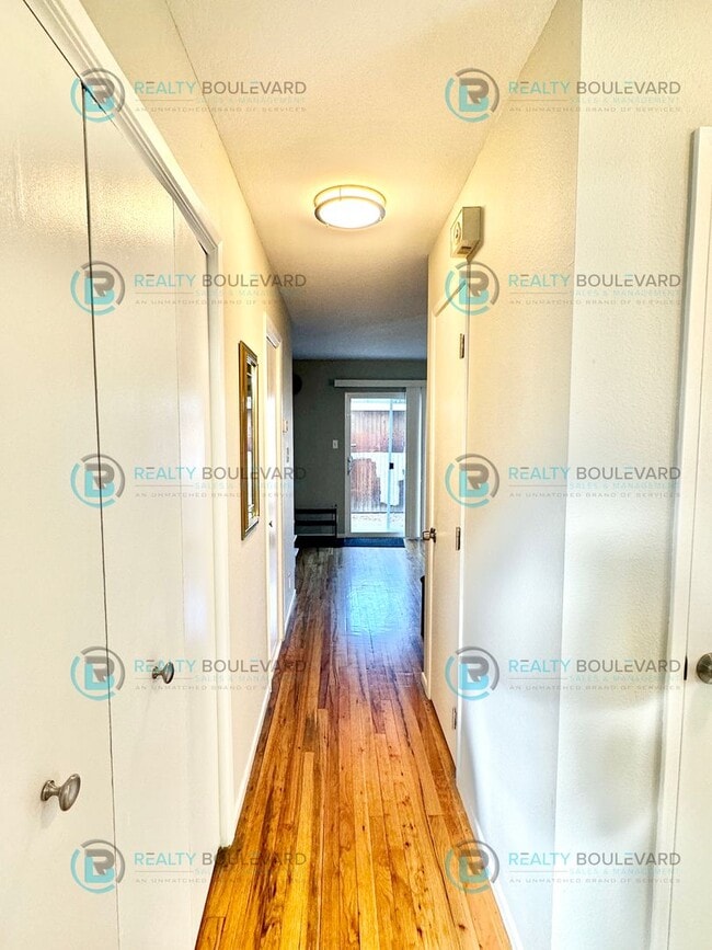 Building Photo - 2-bed, 2-bath, 2-story townhome with pool and park like setting outside the front door.