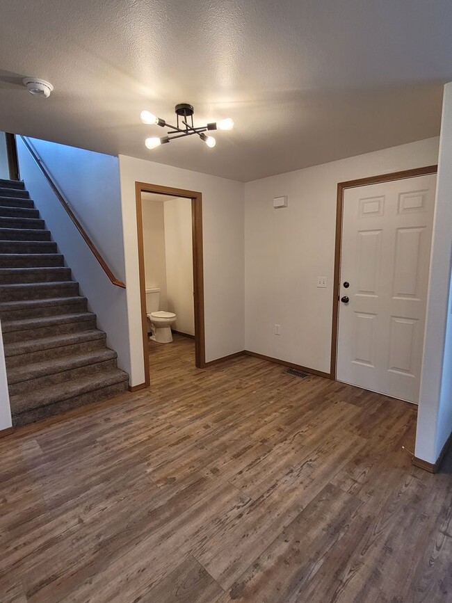 Building Photo - August Rent FREE - 4 Bedroom / Triple Car Garage