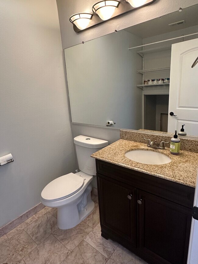 half bath with laundy hook up - 4365 McLaughlin Ave