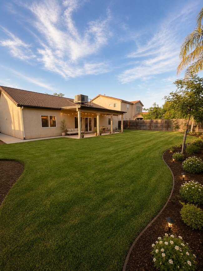 Building Photo - Spacious 4BR/2BA Family Home in Fowler – Move-In Ready for Summer!