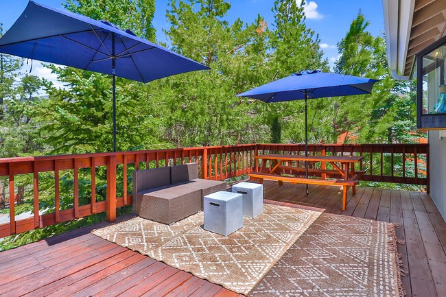 Building Photo - Charming 3 Bed Mountain Retreat | Wood Beams, Fireplace & Deck