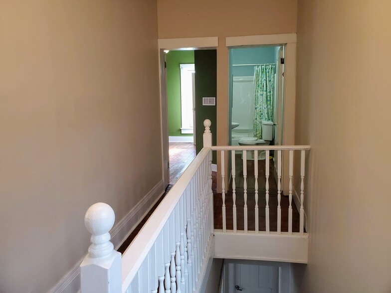 Upstairs Hallway - Rear Bedroom on L, Upstairs Bathroom on R - 265 S Skidmore St