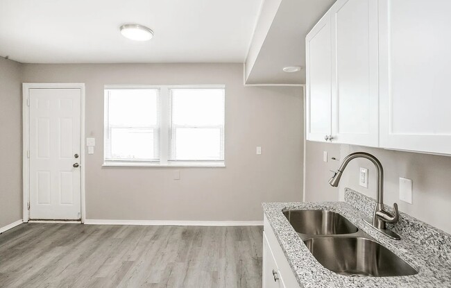 Cannot get over the beautiful lighting with the wonderful fresh paint and new appliances. - 1902 E Calvert St