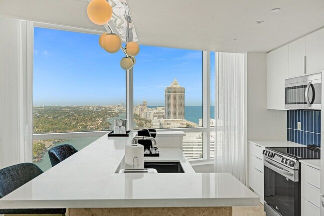 Building Photo - 4401 Collins Ave