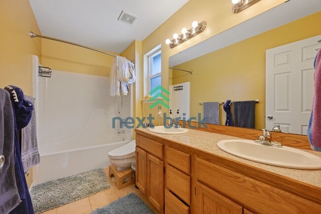 Building Photo - Discover Spacious Comfort: 4-Bedroom Gem with 2.5 Baths