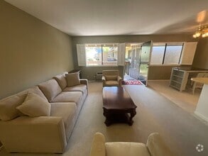 Building Photo - Available Now is a Beautiful Condo Located...