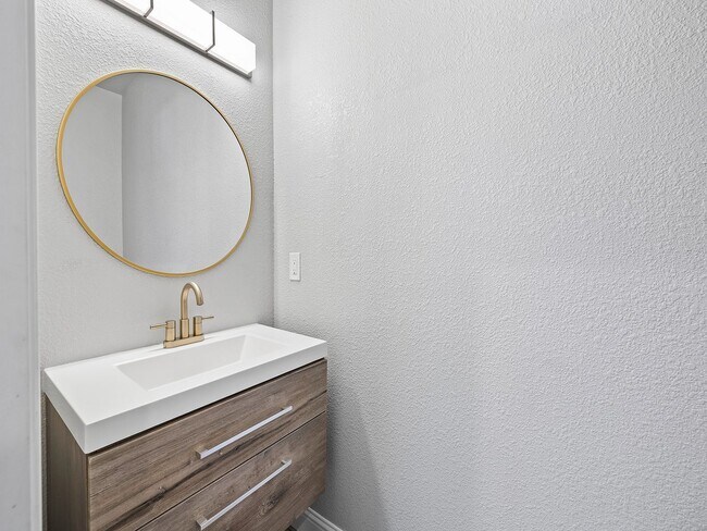 Building Photo - 4-Bedroom Townhome with Finished Basement, Garage & Private Outdoor Space