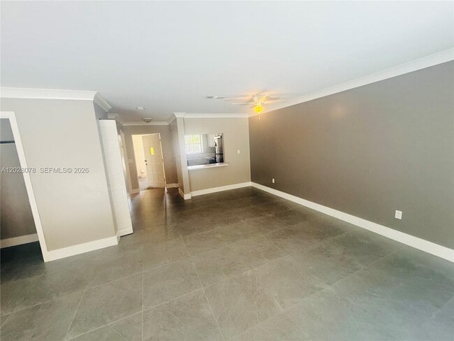 Building Photo - 10787 Royal Palm Blvd