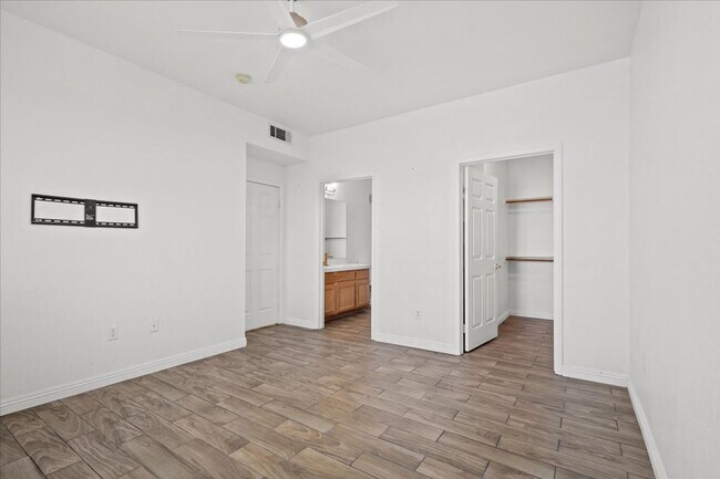 Building Photo - Charming 2-Bedroom First Floor Featuring Open Layout, Fireplace, Patio & Community Pool