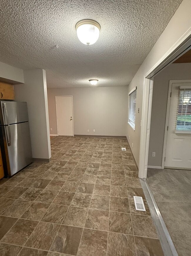 Building Photo - Charming 3 Bedroom with a Living Room, Sun Room,Huge Fenced Yard & More!